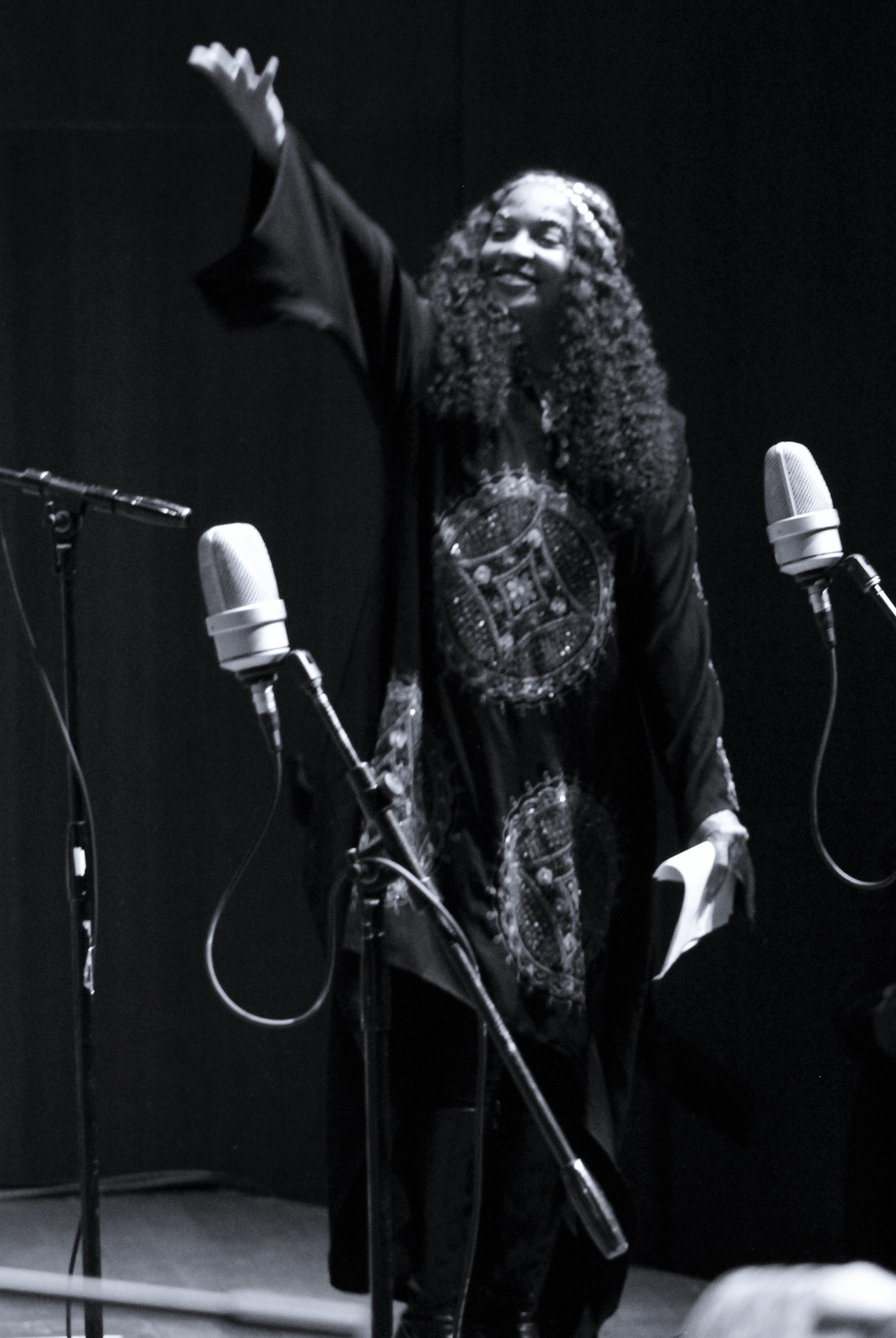 Coco Elysses performing percussion at the AACM 55th Anniversary Concert, photographed by Dr. Traci Lombre